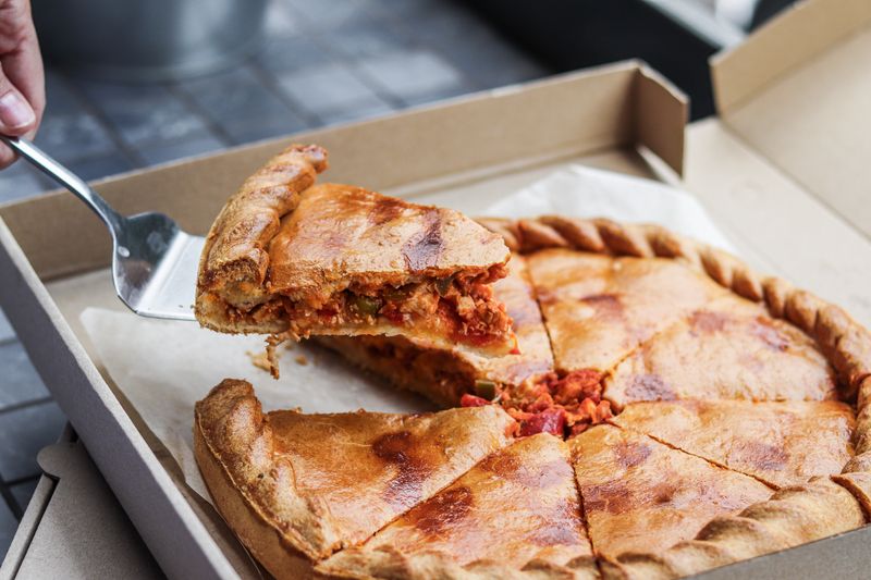 Supreme deep dish pizza with vegetables and sausage at Giordanos